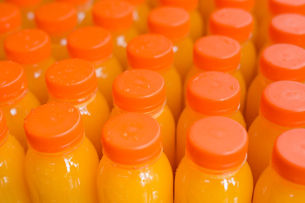 Bulk orange juice bottle packaging