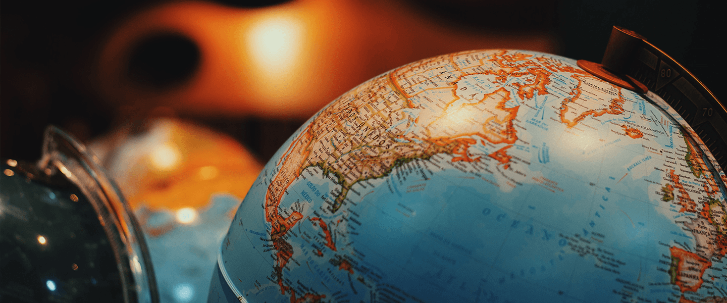 Image of world globe against dark background